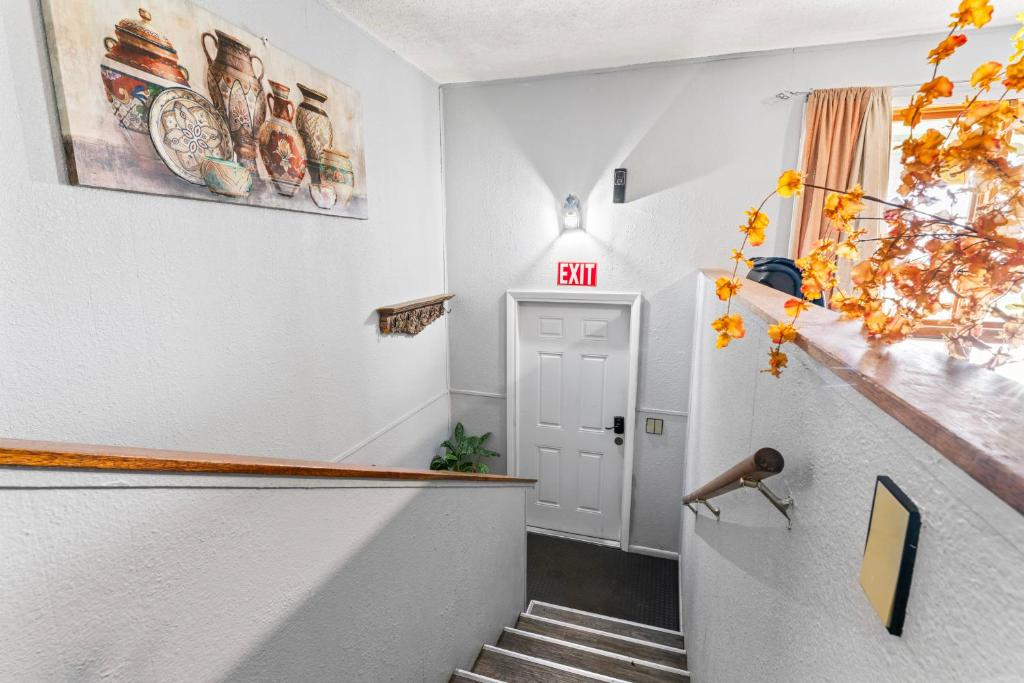 Entry table with sunset artwork, East 6th Avenue guest house