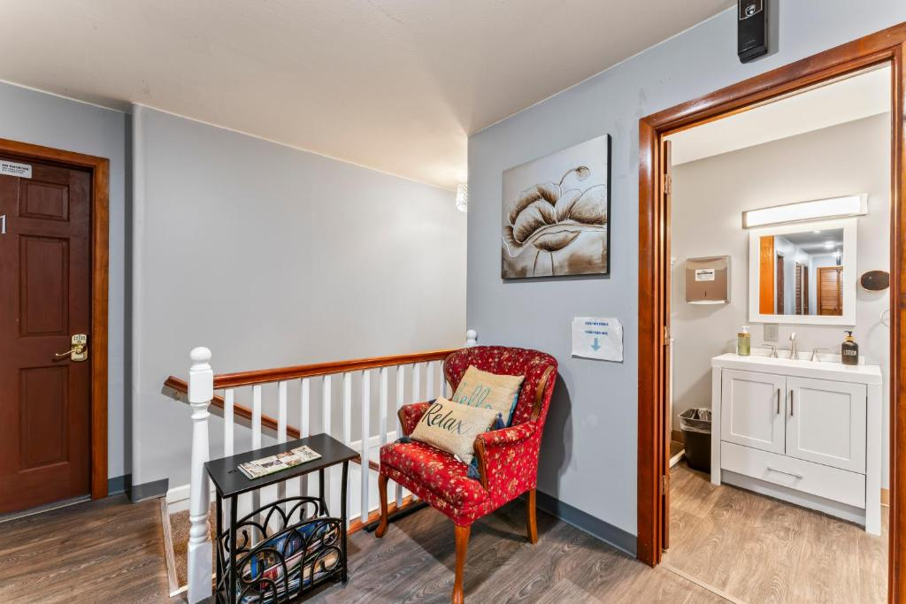 Two double beds with blue and yellow curtains, East 16th Avenue Anchorage