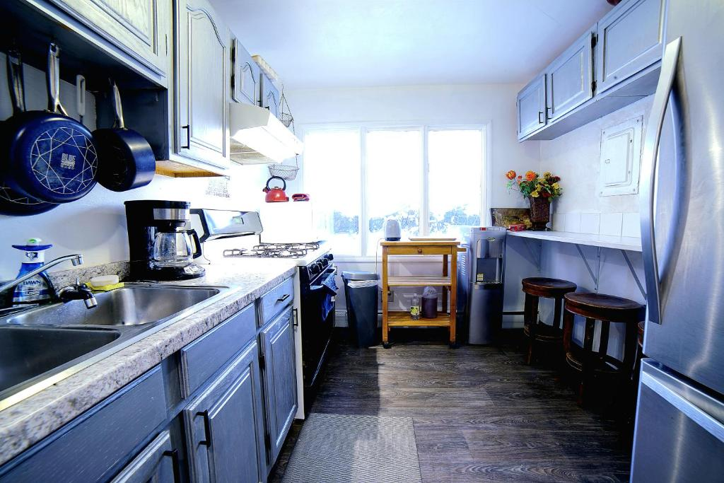 Shared guesthouse kitchen, Cozy Private Room With Two Beds, Anchorage AK