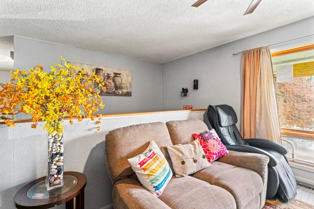 Living room with patterned tile staircase, ShaligoHomes Sunset Room, Anchorage
